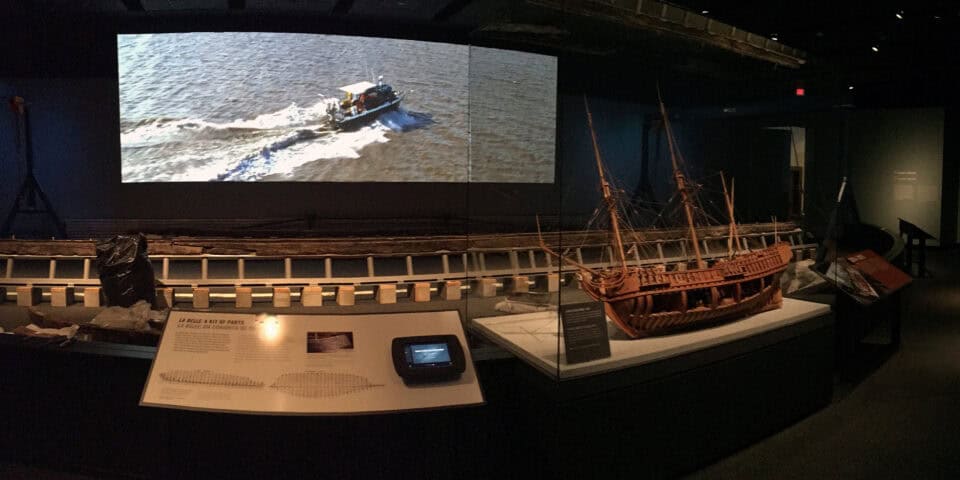 ship on display with video behind