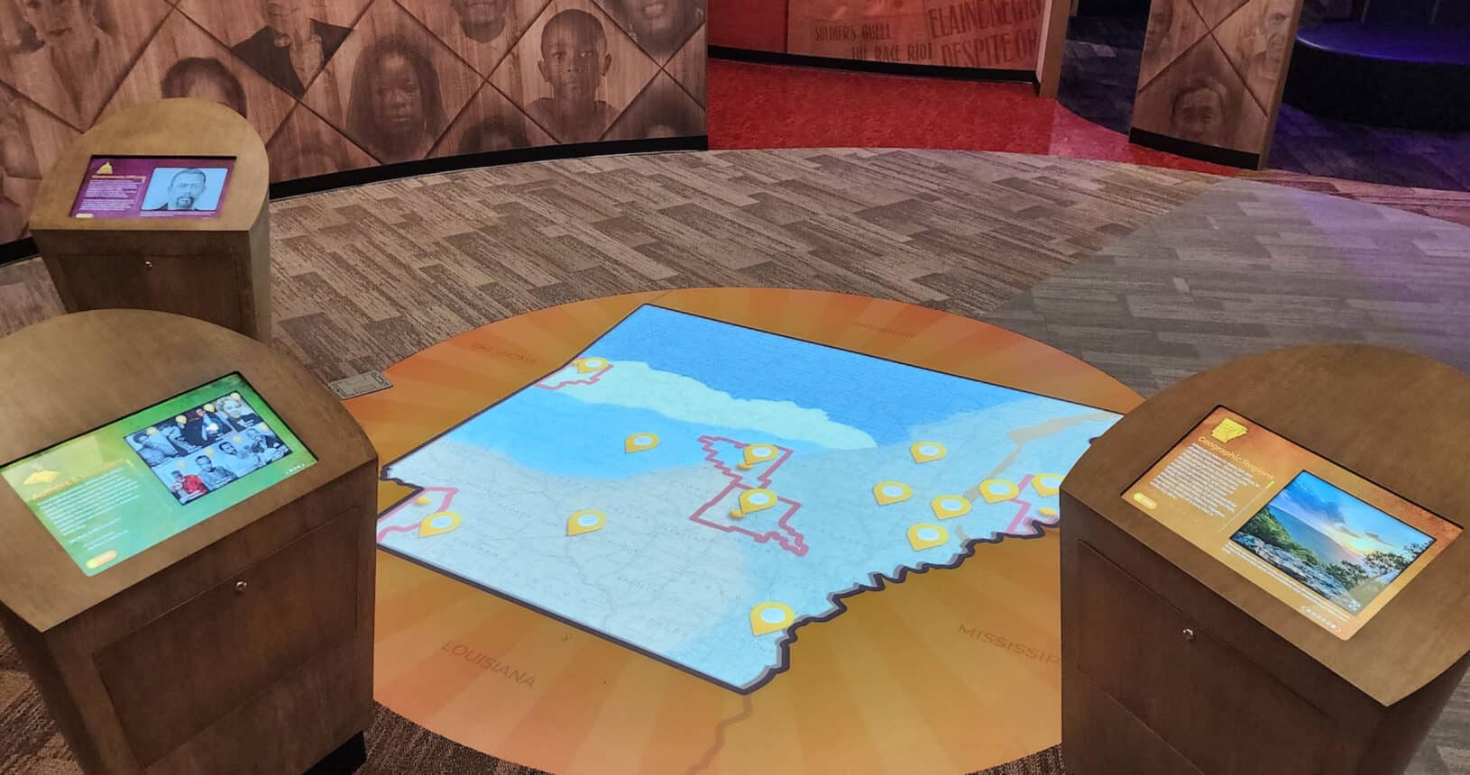 3 touchscreens around floor projected map